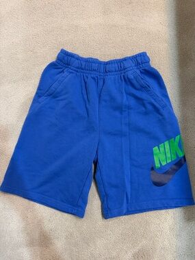 Youth Nike Blue Kids Logo Athletic Shorts with Green Accent